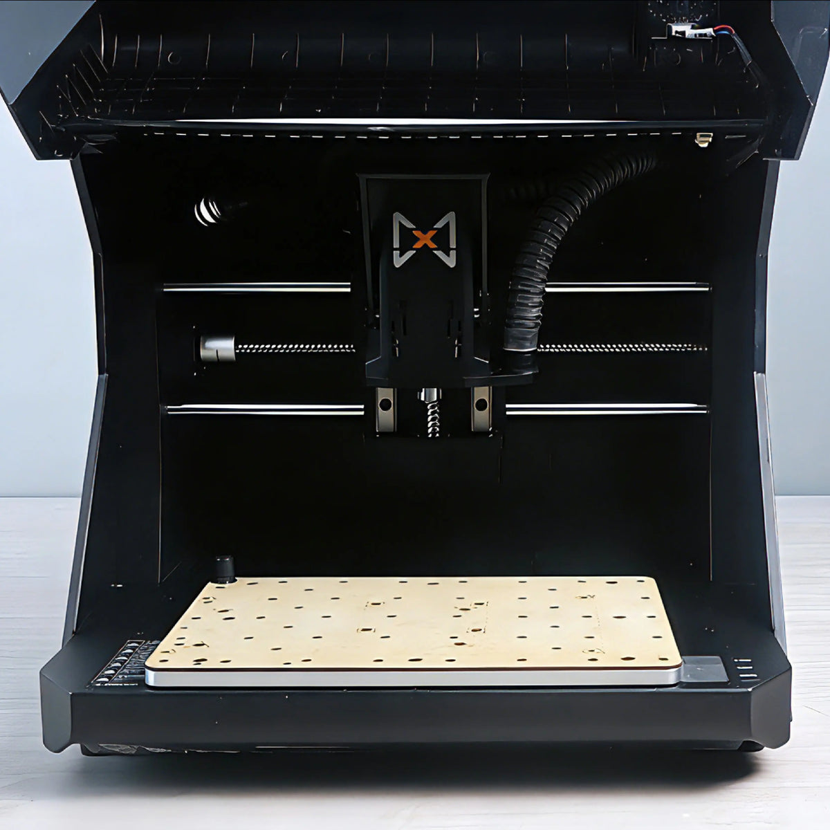 MDF spoilboard installed inside the HiMill CNC machine base.