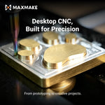 Close-up of the MAXMAKE HiMill desktop CNC machine milling a custom brass part, showcasing high precision for prototyping and creative projects.