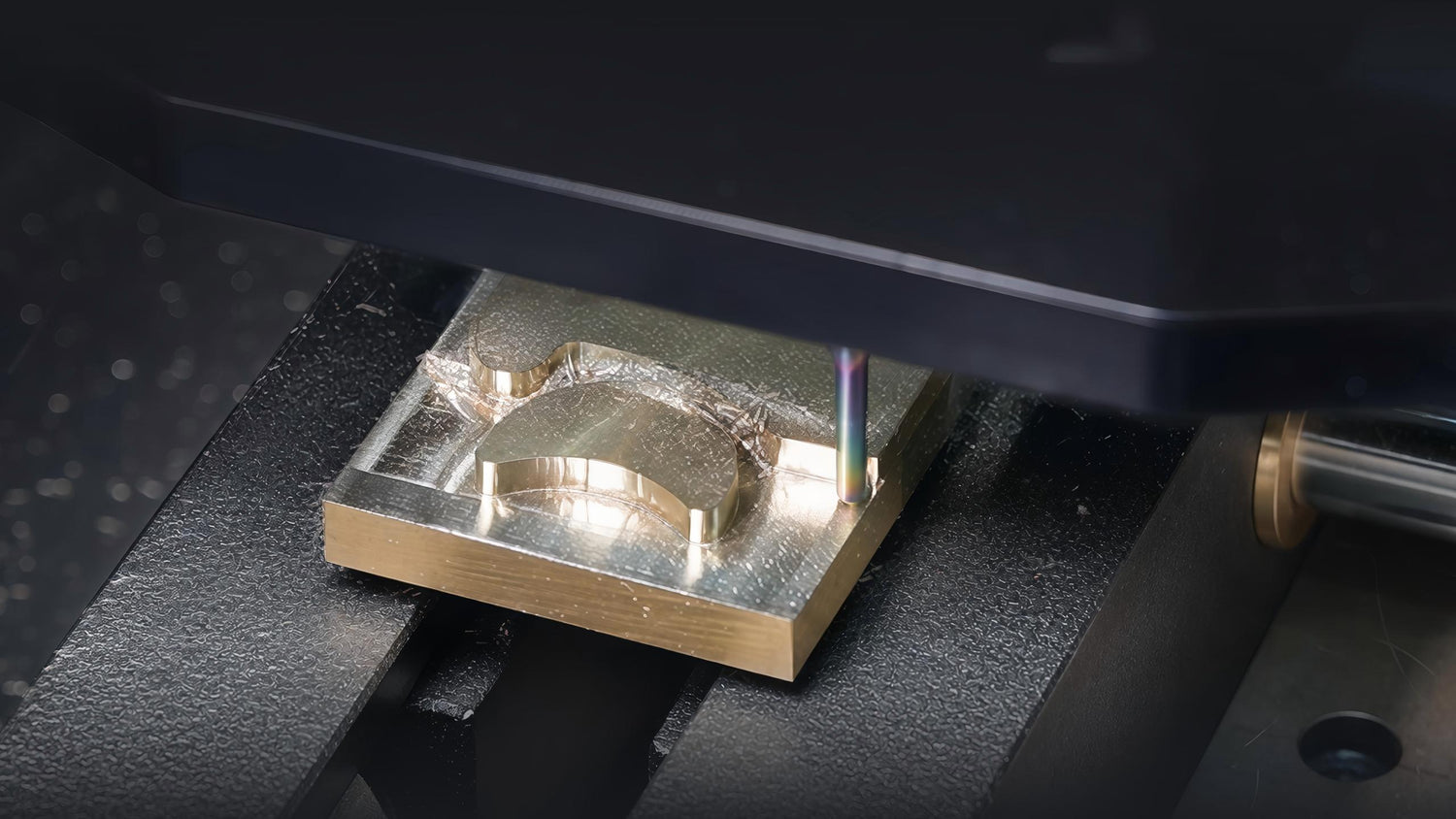 MAXMAKE HiMill D1S desktop CNC achieving flawless surface finish on a solid brass block with ±0.02mm accuracy.